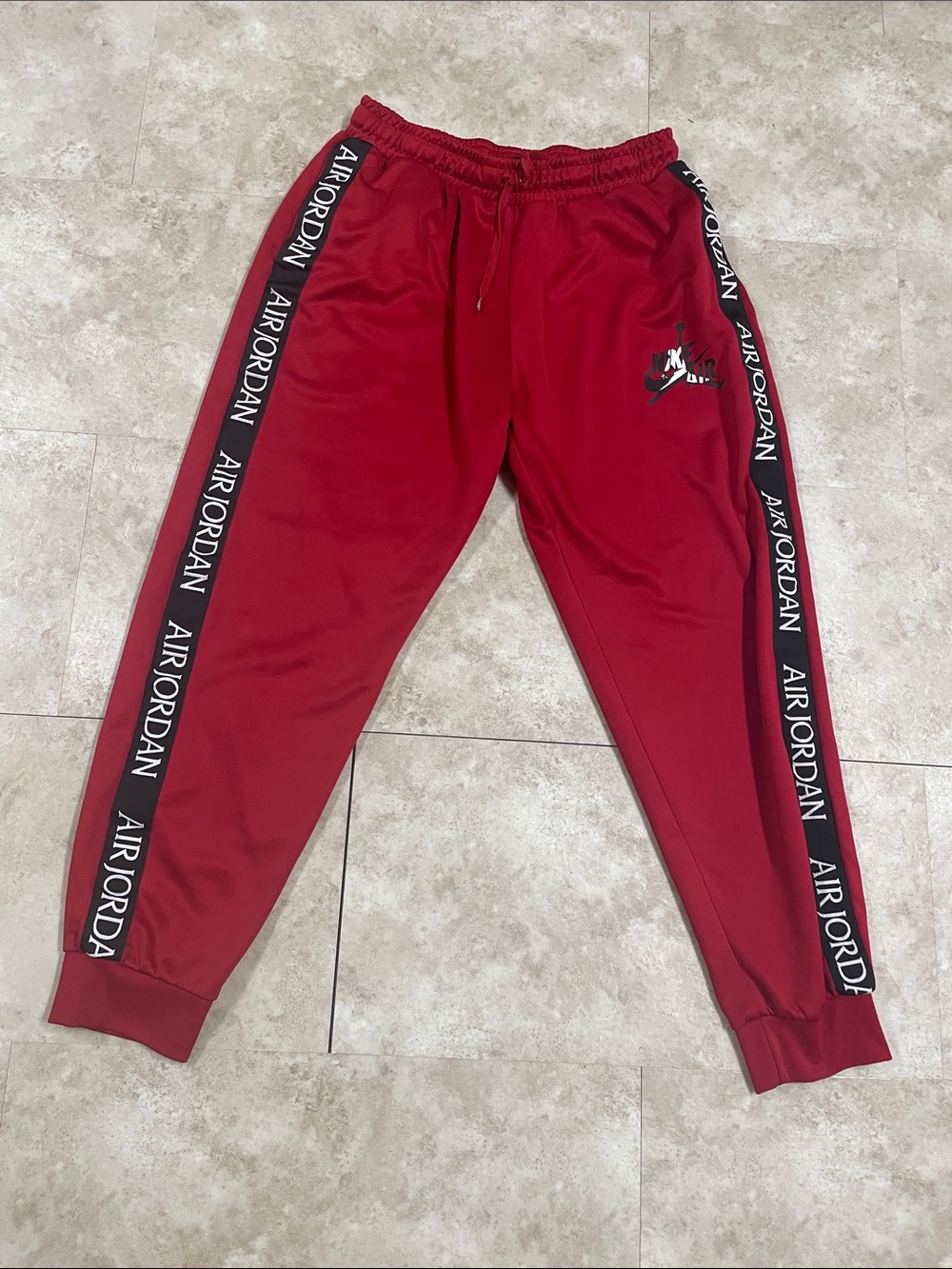 Jordan mens Red Track Joggers with Black Side Logo Tape XL